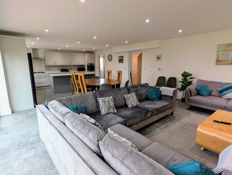 A practical, comfortable area for meals, downtime and socialising after a busy day.