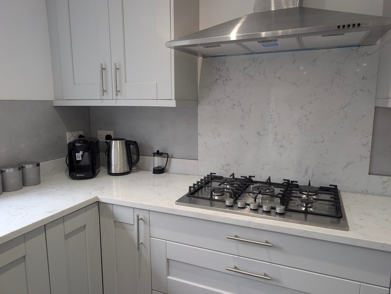 A fully equipped kitchen with modern appliances, ample worktop space and plenty of storage — ideal for groups  staying together and catering for themselves.