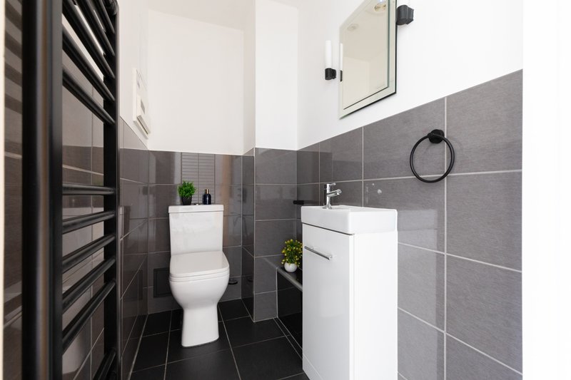 Downstairs WC with wash hand basin.