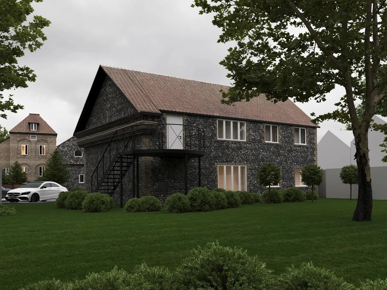 Modern brick house with pitched roof, large windows, manicured lawn and surrounding trees