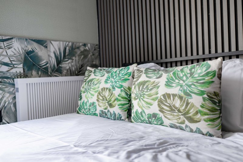 Wake refreshed in a calm and inviting space.