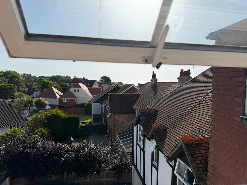 Rooftop view through skylight window