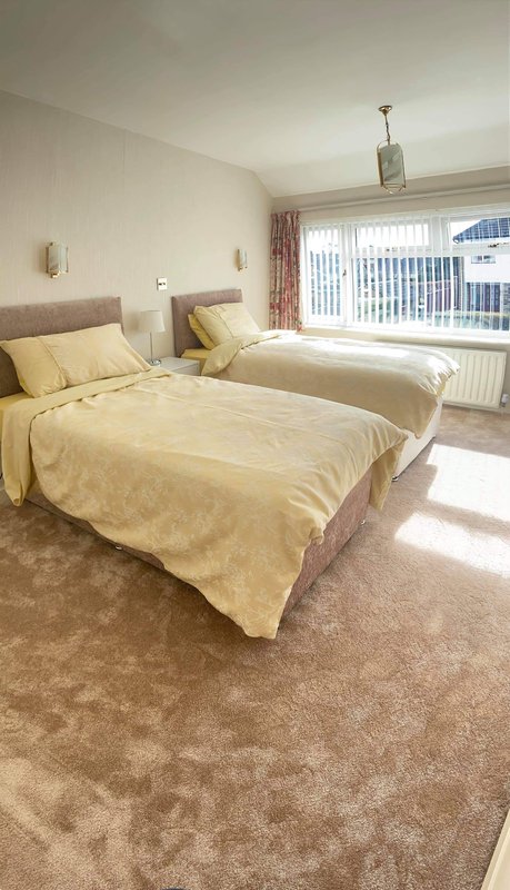 Double room with two single beds, fitted wardrobes and 32inch smart TV