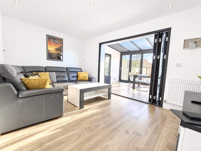 Lounge leads into the dining area. The bi-fold doors are often left open giving this room an open plan feel.