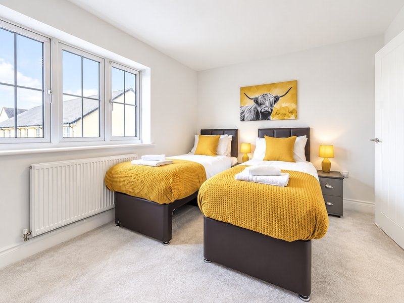 Our standard set up is a king size bed but with zip & link beds there's the option of twin rooms. Bedroom 1 has an en-suite shower room. This room has wall mounted TV and wardrobes.