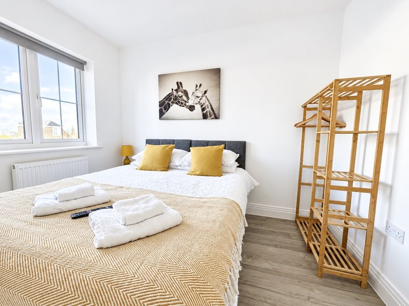 Our standard set up is a king size bed but with zip & link beds there's the option of twin rooms. Bedroom 2 is next door to the main bathroom. Wall mounted TV, drawers and hanging rail.