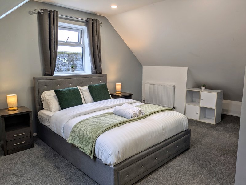 A spacious, comfortable double bedroom offering a quiet place to relax and recharge after a busy day. Featuring a quality double bed, fresh towels and plenty of space to unwind