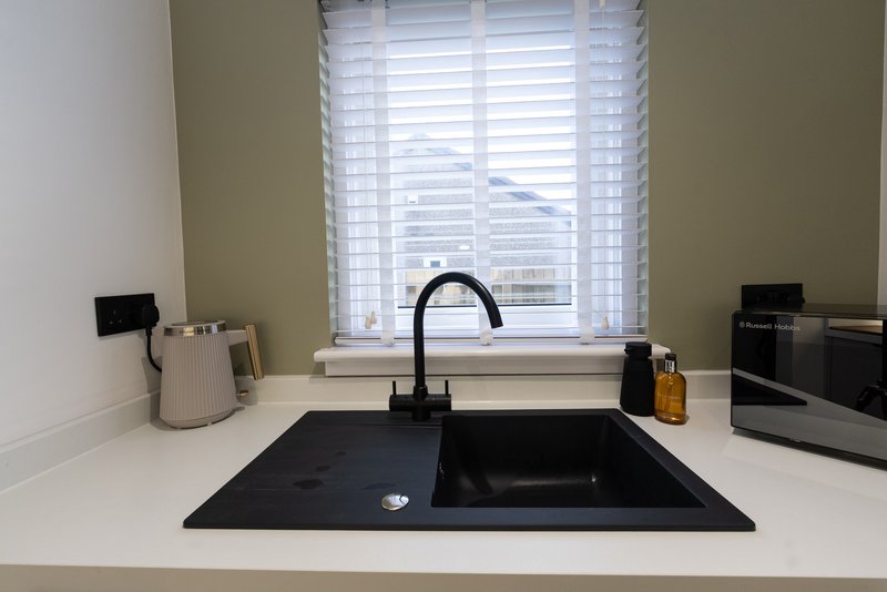 Stylish 1BR House with Garden & Parking