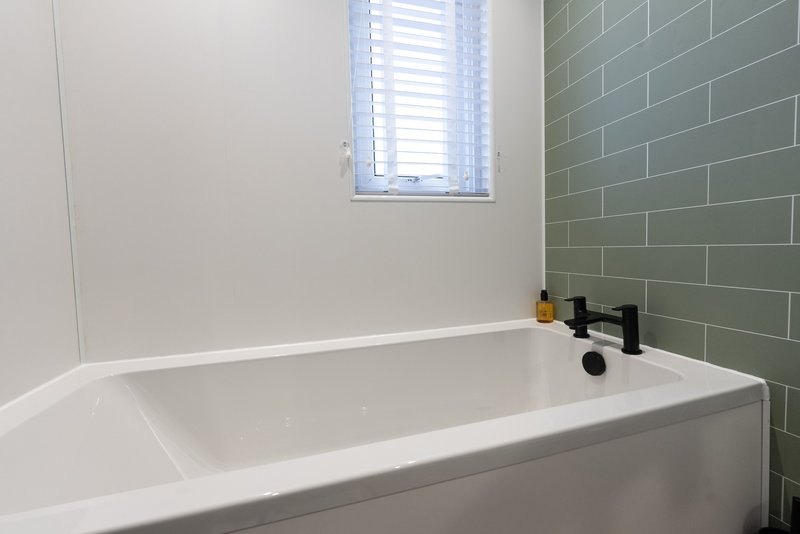Stylish 1BR House with Garden & Parking
