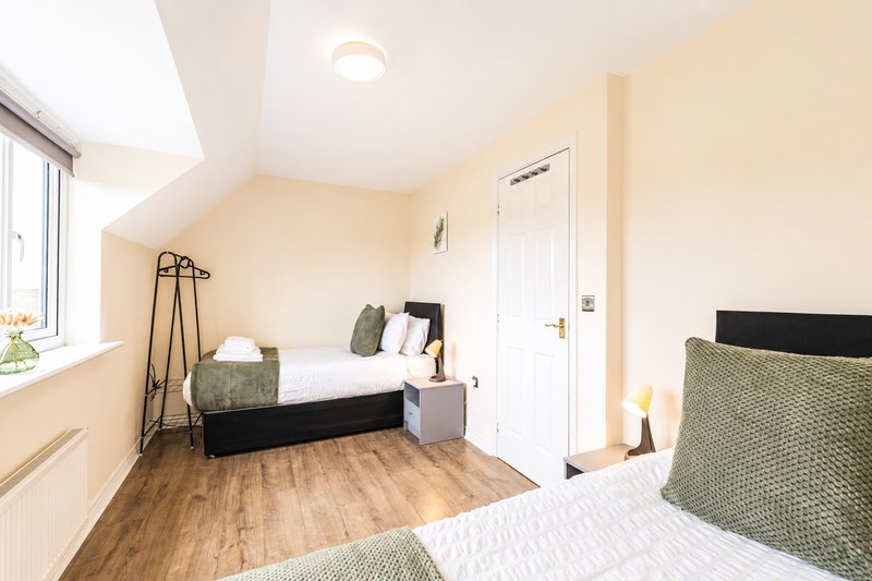 Flexible bedroom setup with zip-link beds that can be arranged as either a luxurious king-size bed or two large single beds. Bright, spacious, and thoughtfully furnished with fresh linens.