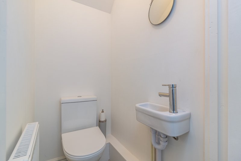 Additional ground-floor WC with wash basin, providing convenient extra facilities for contractor teams and larger groups.