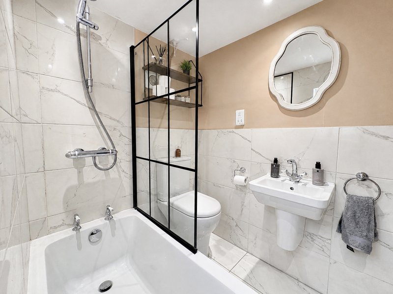 Modern bathroom with complimentary toiletries.