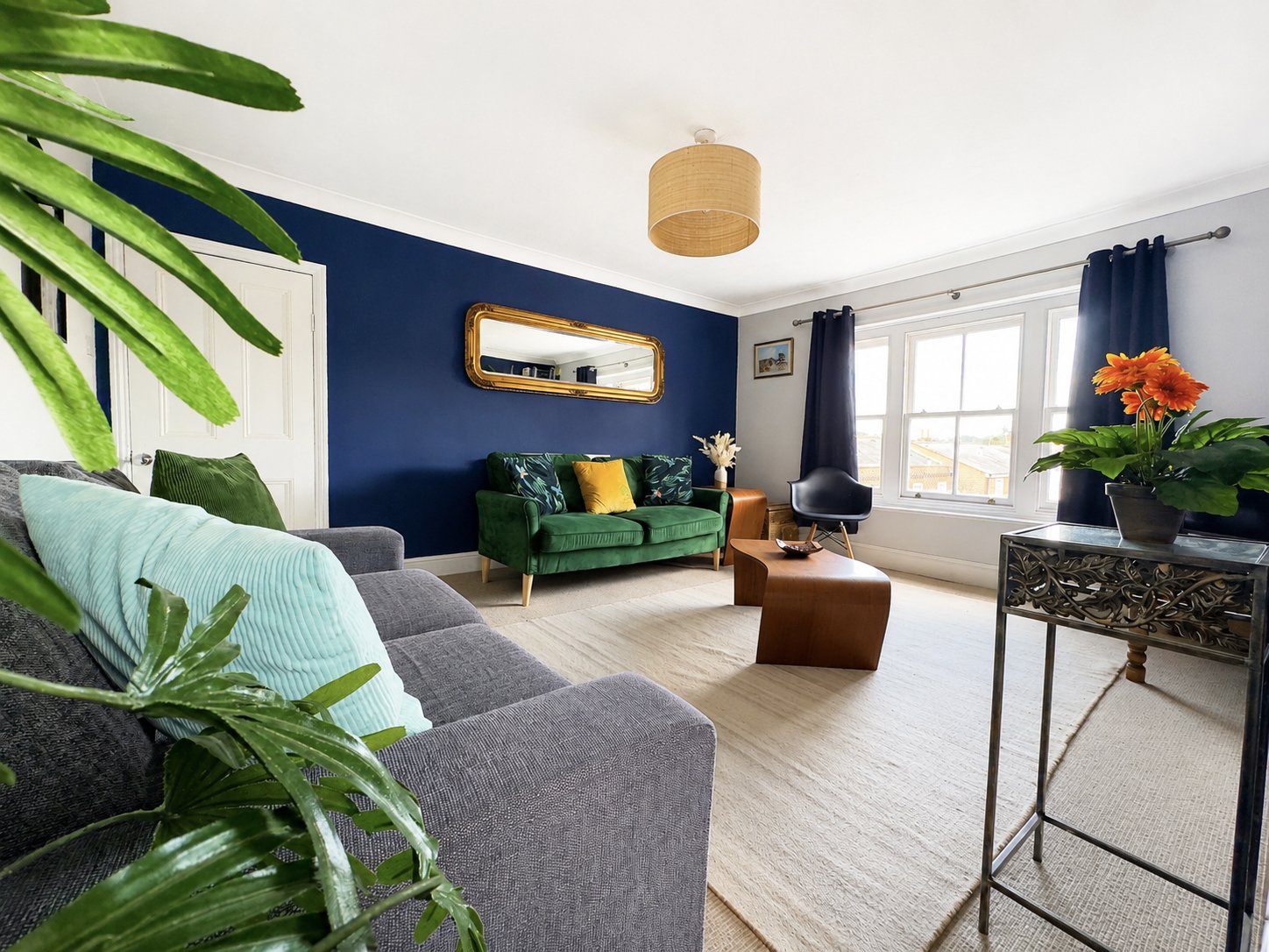 Bright & airy lounge with two settees, coffee tables and smart TV to connect to all your favourite apps while away from home.