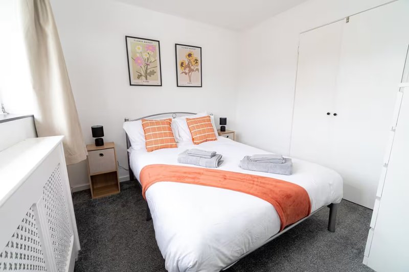 Bright bedroom with double bed