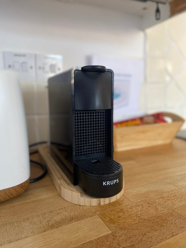 Kitchen counter with black coffee machine