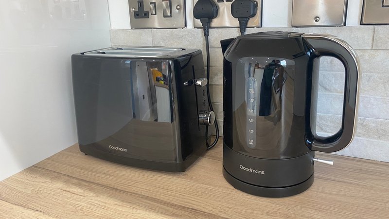 Kitchen countertop with black toaster, kettle