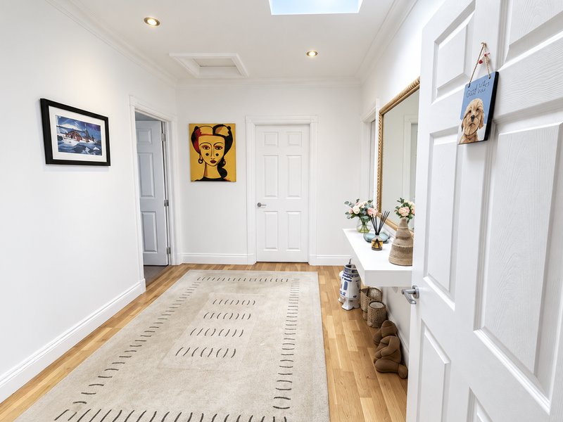 Spacious hallway with wooden floor
