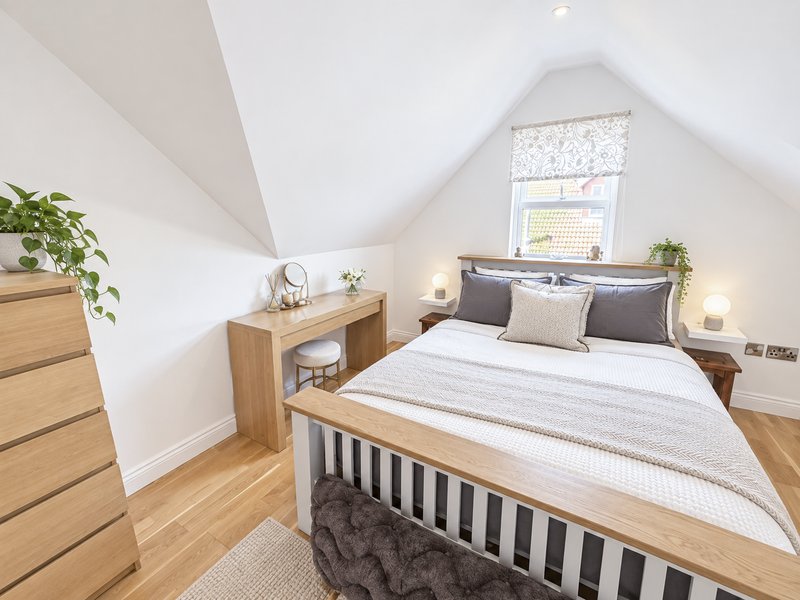 Bedroom 2 - Kingsize bed with cupboards and drawers. En-suite shower room. Bath and hand towels provides for guests along with complimentary toiletries: shampoo, conditioners, hand wash and shower gel