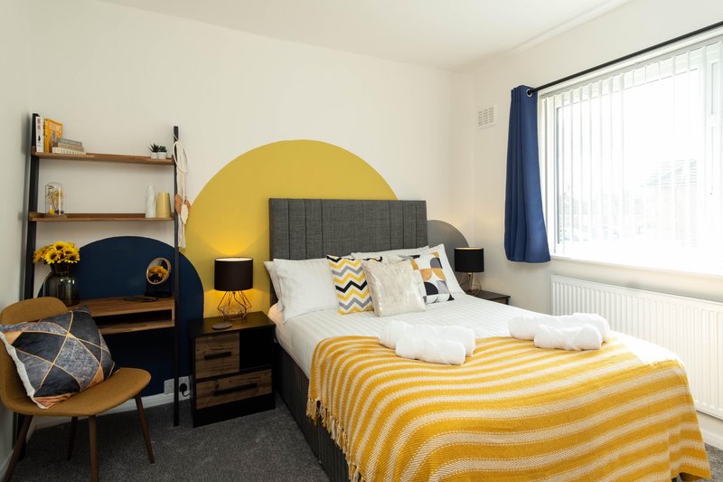 This room is now with 2 single beds on either side with the desk area in the centre.