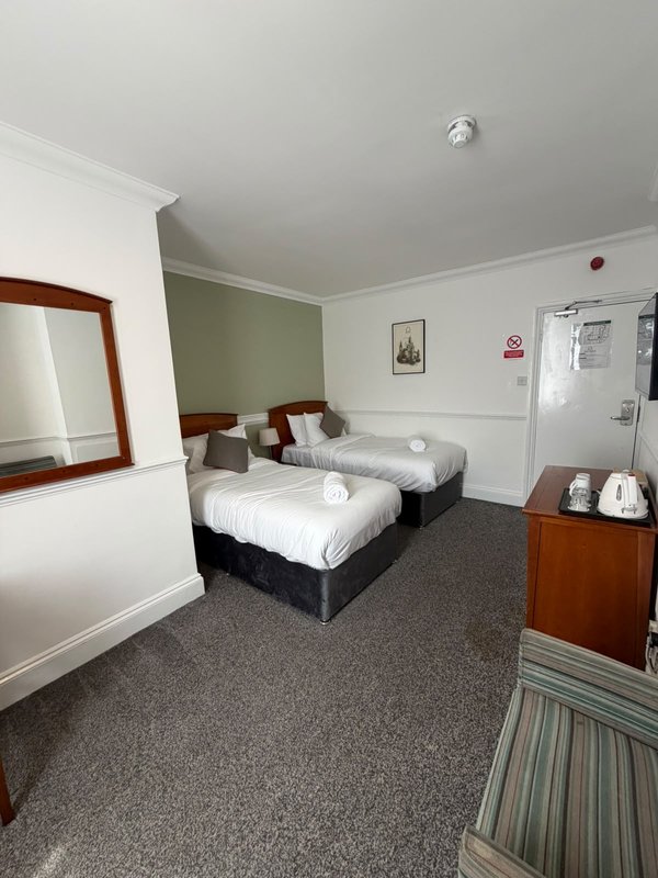 Our Economy Double or Twin Room is ideal for up to two guests. It offers a double or twin bed setup, private bathroom, Smart TV, fast Wi-Fi and tea and coffee facilities. Room layouts may vary.
