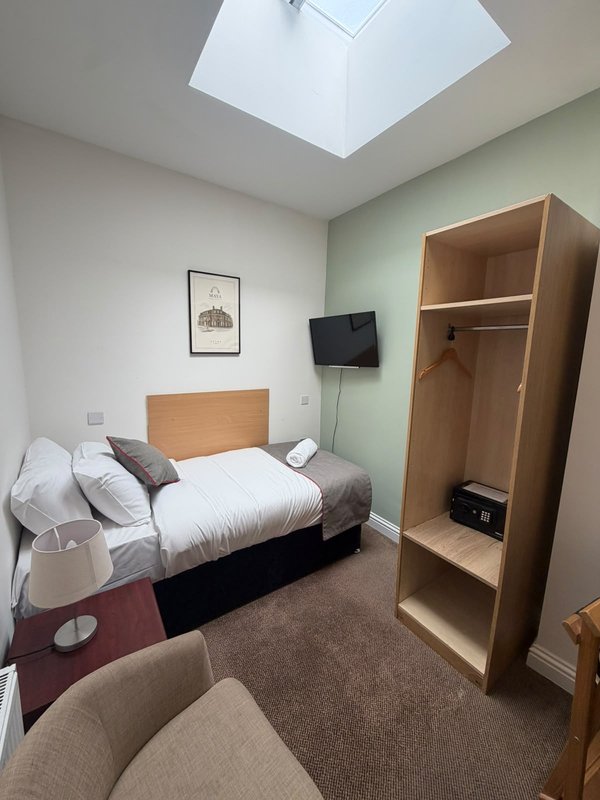 Relax in our cosy Maya Single Room, ideal for one guest. It offers a comfortable single bed, private bathroom, Smart TV, fast Wi-Fi and tea and coffee facilities. Room layouts and décor may vary.