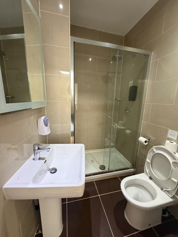 Relax in our cosy Maya Single Room, ideal for one guest. It offers a comfortable single bed, private bathroom, Smart TV, fast Wi-Fi and tea and coffee facilities. Room layouts and décor may vary.