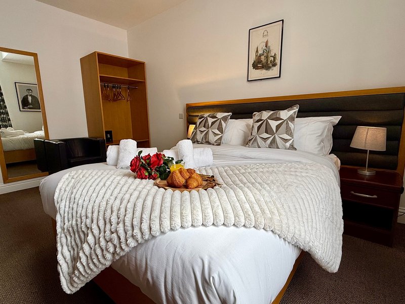 Relax in our stylish Premium Double Room, ideal for up to two guests. It offers a double bed, private bathroom, Smart TV, fast Wi-Fi and tea and coffee facilities. Room layouts and décor may vary.
