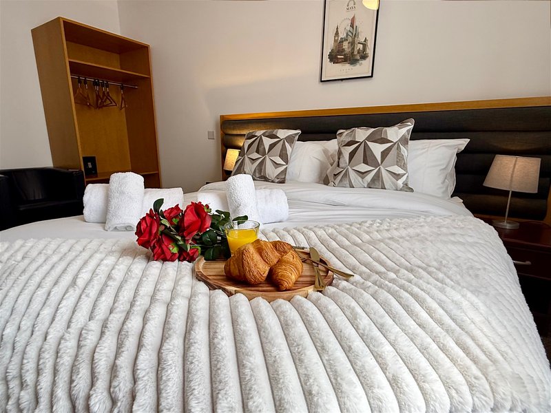 Relax in our stylish Premium Double Room, ideal for up to two guests. It offers a double bed, private bathroom, Smart TV, fast Wi-Fi and tea and coffee facilities. Room layouts and décor may vary.