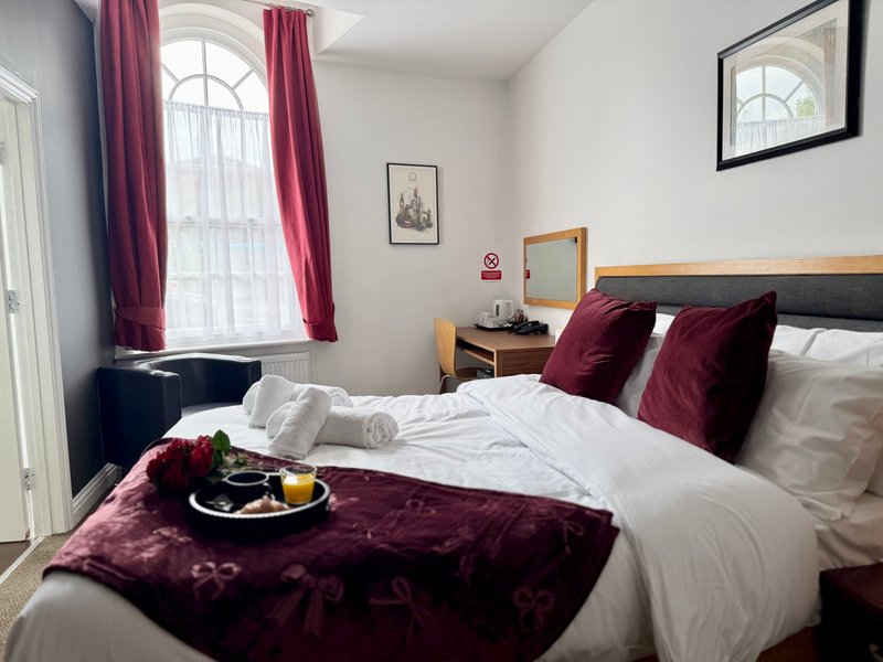 Relax in our cosy Classic Double Room, ideal for up to two guests. It offers a double bed, private bathroom, Smart TV, fast Wi-Fi and tea and coffee facilities. Room layouts and décor may vary.