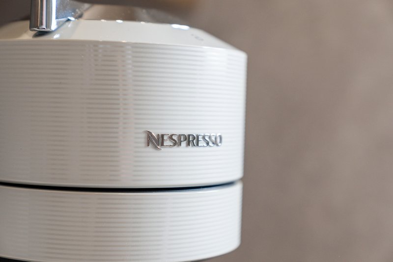 White Nespresso coffee machine on kitchen counter