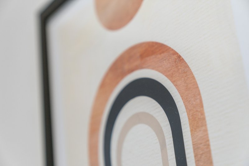 Abstract wall art print with concentric arches in terracotta, navy and cream tones