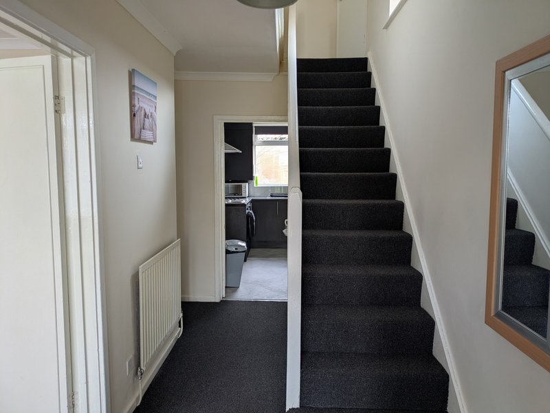 A bright, welcoming entrance, providing easy access between the living areas and bedrooms.