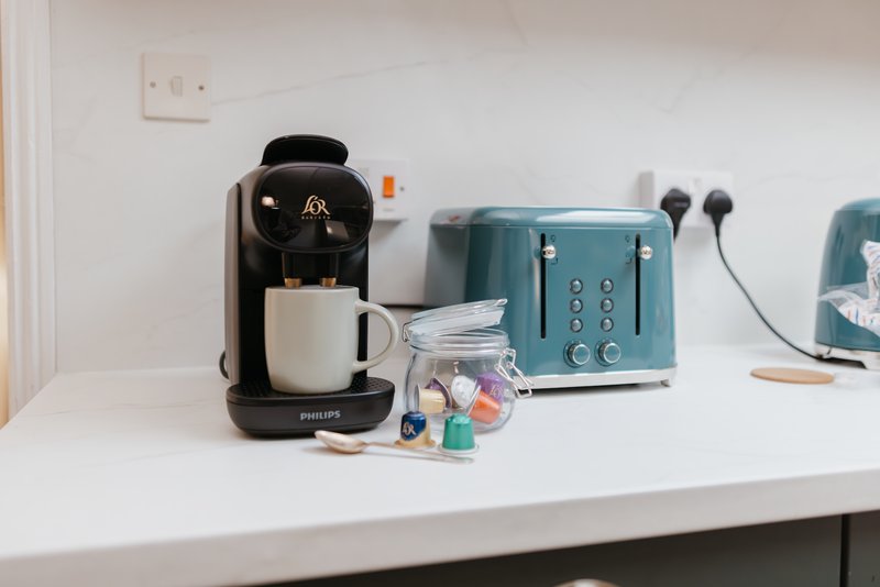 Complimentary tea, sugar, Nespresso coffee machine pods to get you going, along with salt, pepper, oil and some herbs and spices.