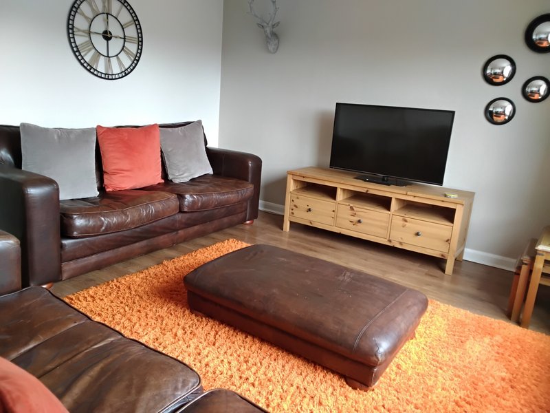 Town centre self catering apartment with off road parking.