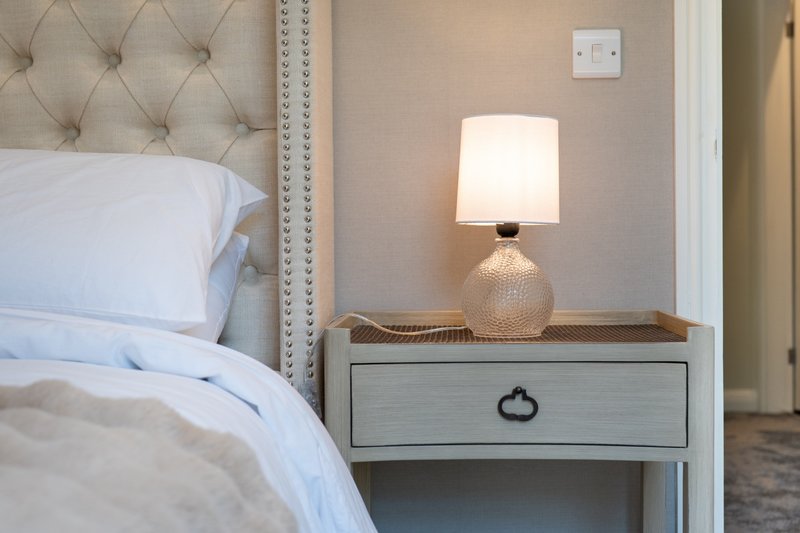 Sink into fresh, hotel-quality bedding in a peaceful bedroom designed for restful nights.