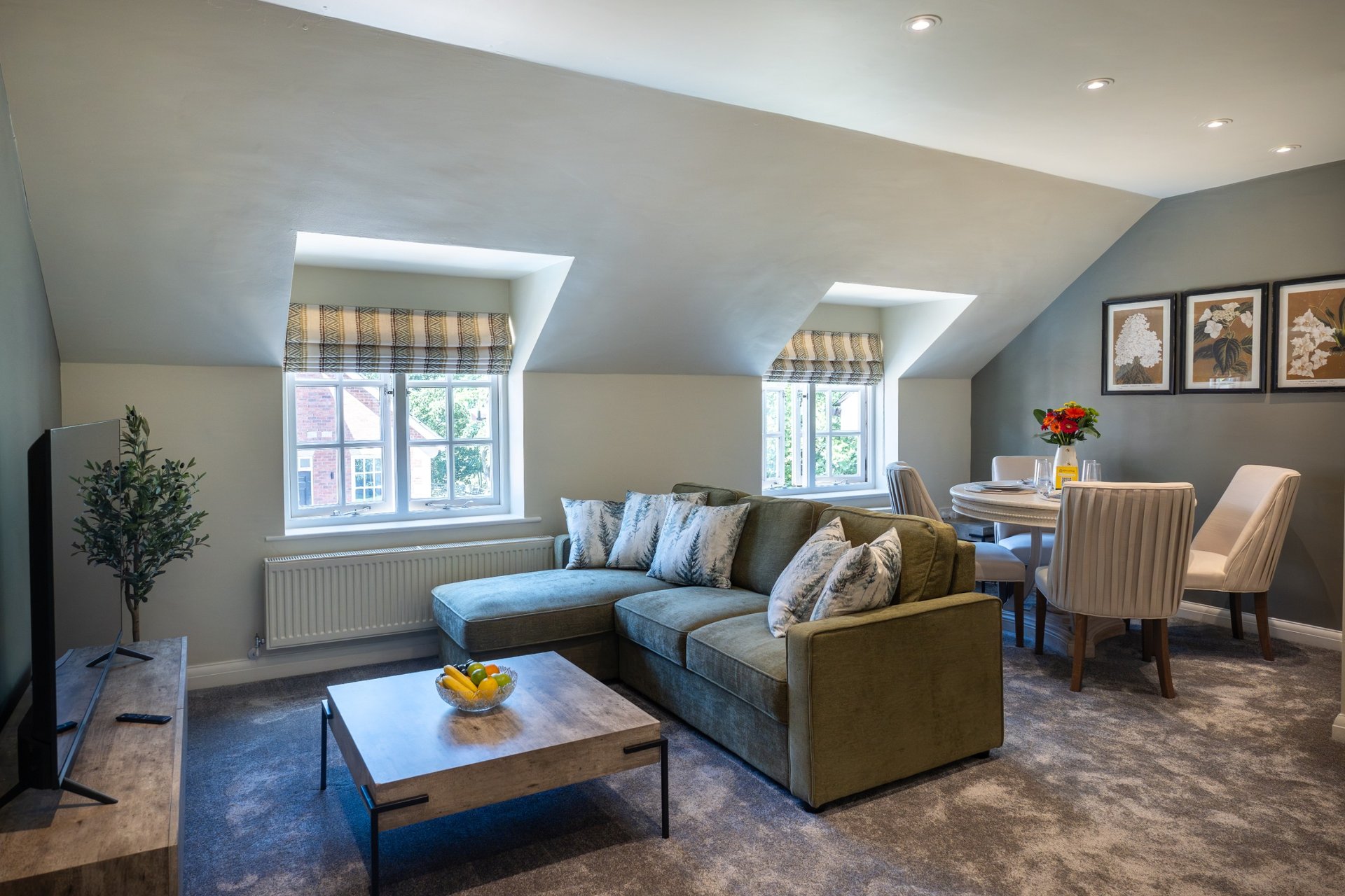 Open-plan lounge and dining space with a sofa bed and Smart TV, great for winding down after a day out in Congleton.