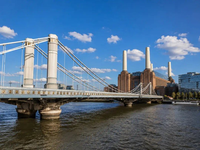 Albert Bridge spanning the Thames with Battersea Power Station and London skyline visible