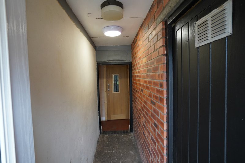 Private entrance providing guests with their own separate and secure access to the flat, ensuring privacy and convenience throughout their stay.