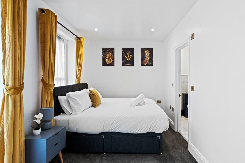 Comfortable king-size bedroom setup with bedside storage; twin configuration available on request.