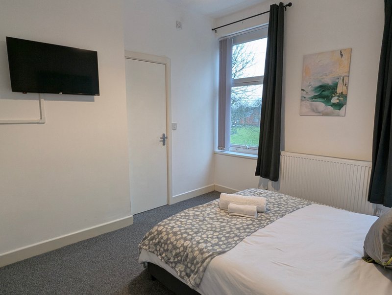 All bedrooms feature their own TV, giving contractors a comfortable space to unwind and relax after a busy day.